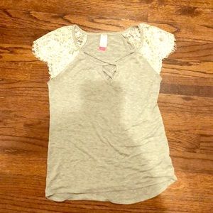 A gray and white lace short sleeve shirt